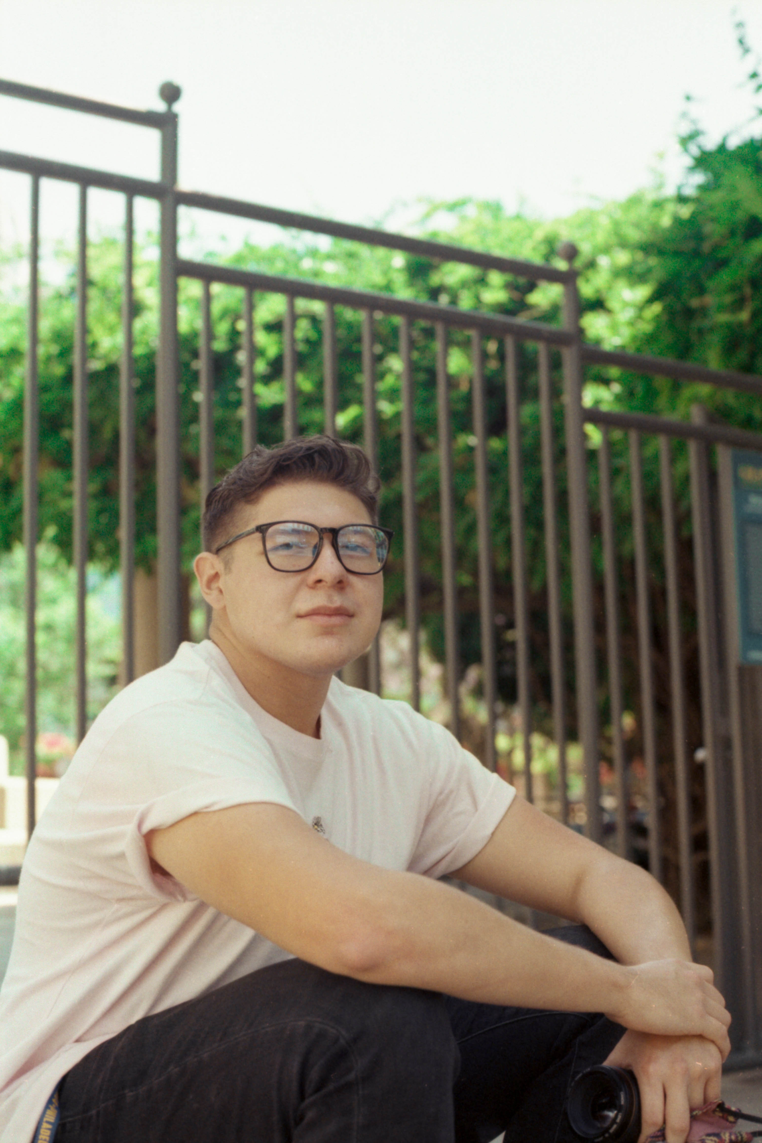 Portrait of a man sitting down