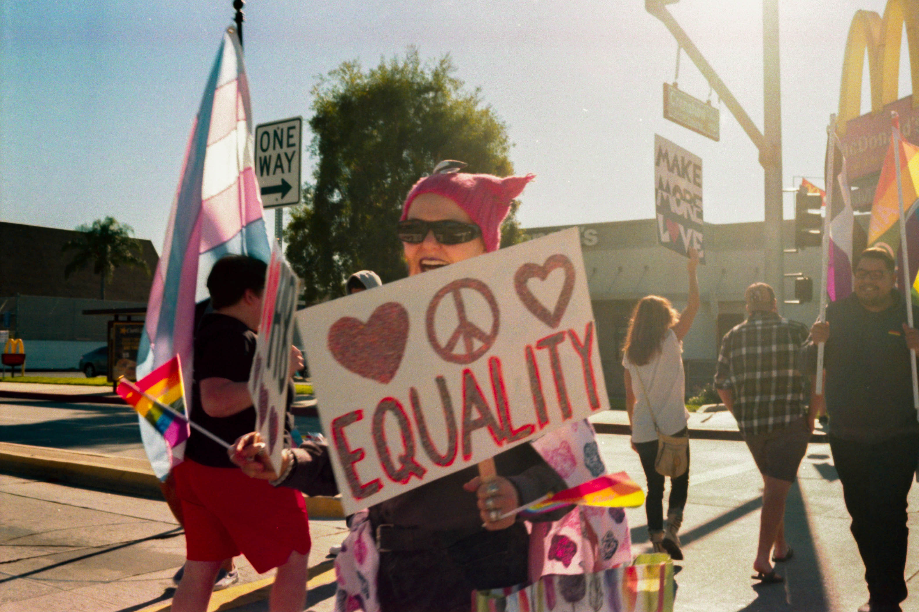 Woman holding an equality sign